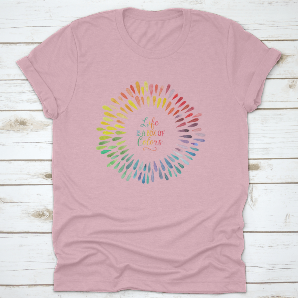 A stylish T-shirt featuring the motivational quote 'Life Is A Box Of Colors' in vibrant colors, made from 100% cotton for comfort.