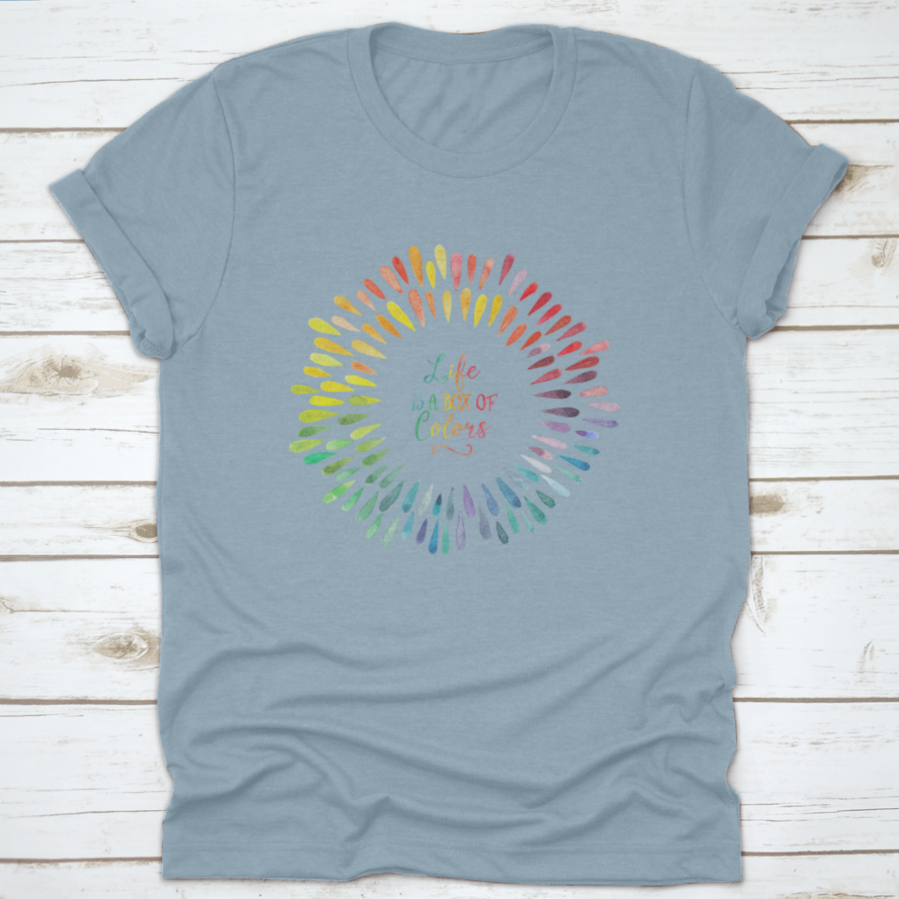 A stylish T-shirt featuring the motivational quote 'Life Is A Box Of Colors' in vibrant colors, made from 100% cotton for comfort.