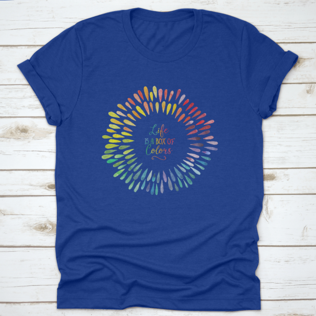 A stylish T-shirt featuring the motivational quote 'Life Is A Box Of Colors' in vibrant colors, made from 100% cotton for comfort.