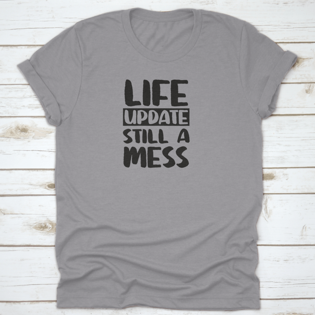 Life Update Still A Mess Design Shirt in grey, showcasing its classic fit and soft cotton fabric.