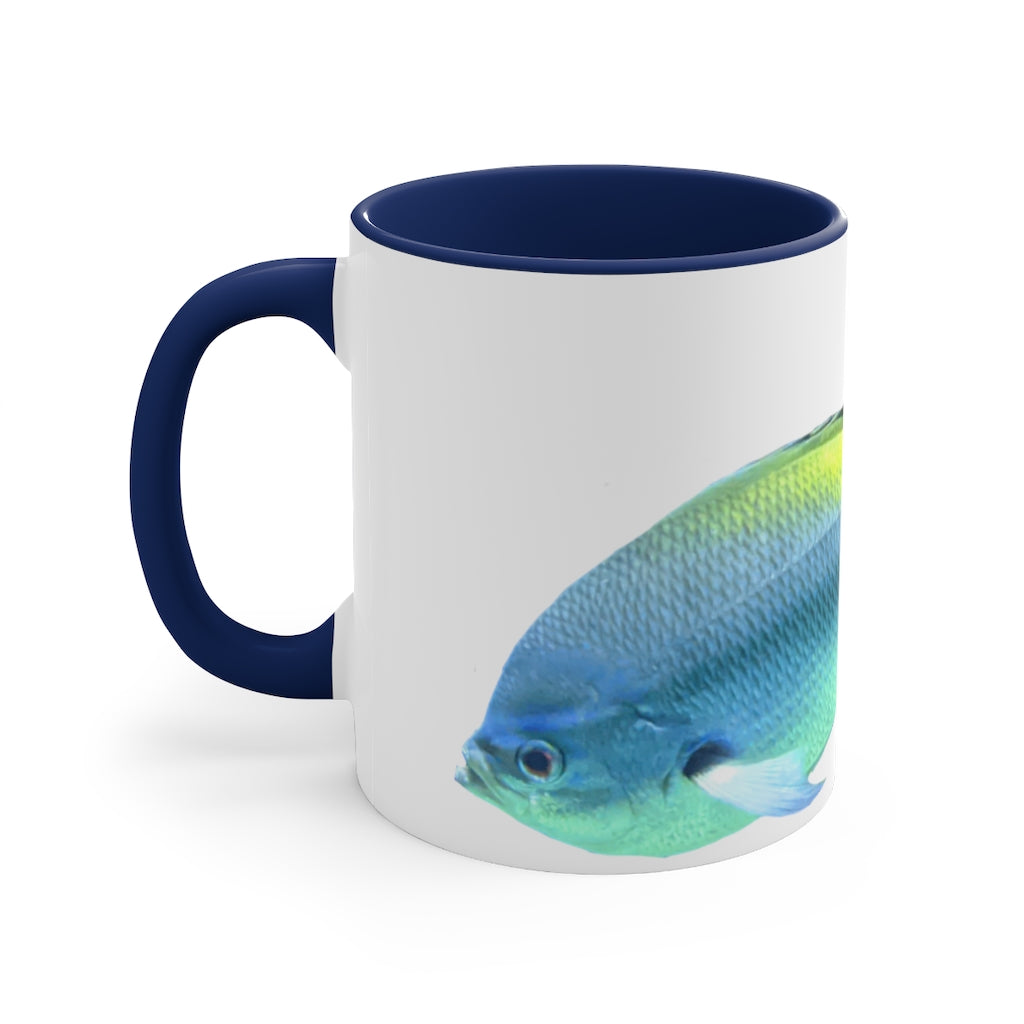 Light Blue and Yellow Fish Accent Coffee Mug with C-handle, showcasing vibrant colors and a stylish design.