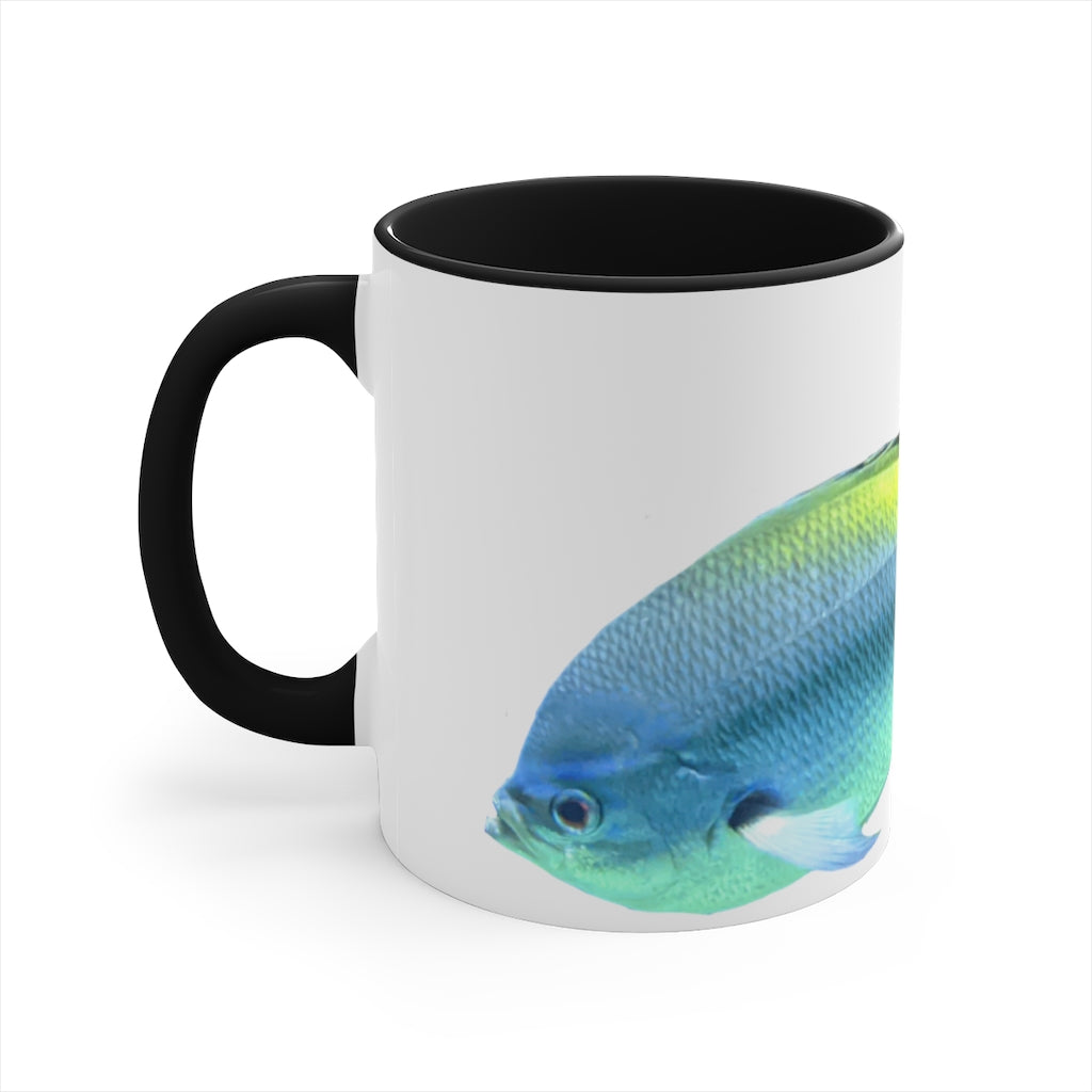 Light Blue and Yellow Fish Accent Coffee Mug with C-handle, showcasing vibrant colors and a stylish design.