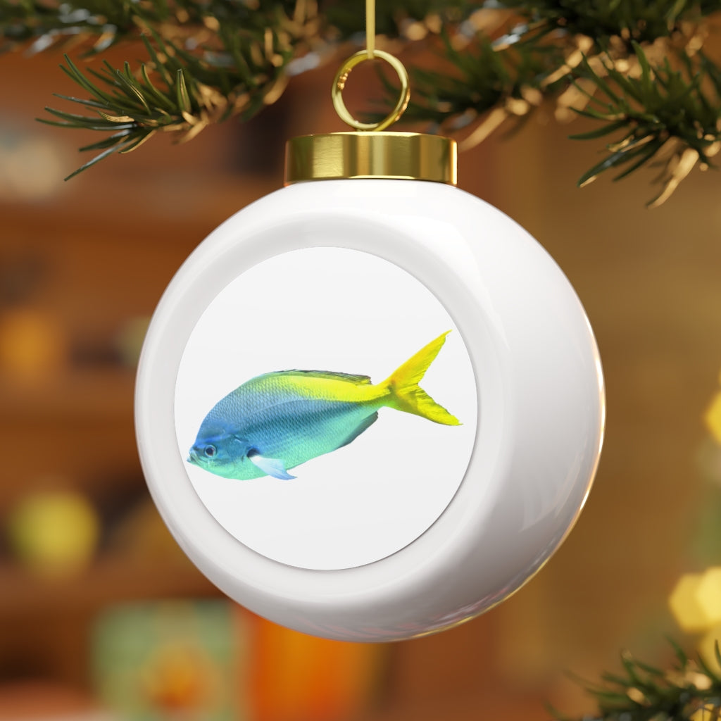 Light Blue and Yellow Fish Christmas Ball Ornament with glossy finish and gold ribbon for hanging.