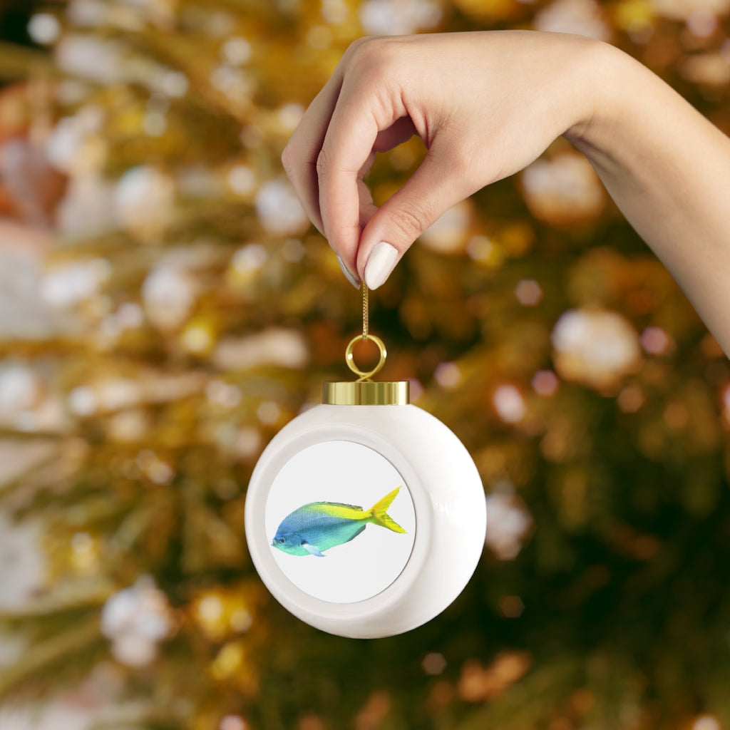 Light Blue and Yellow Fish Christmas Ball Ornament with glossy finish and gold ribbon for hanging.