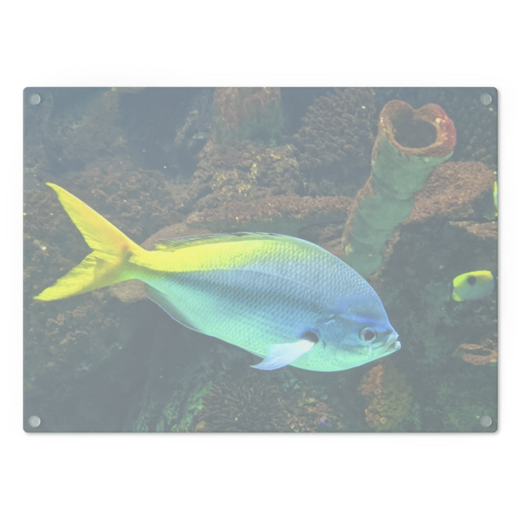 Light Blue and Yellow Fish Cutting Board made of tempered glass with rubber dots for stability.