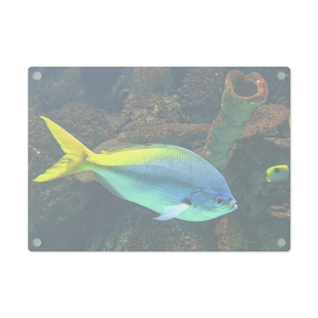 Light Blue and Yellow Fish Cutting Board made of tempered glass with rubber dots for stability.