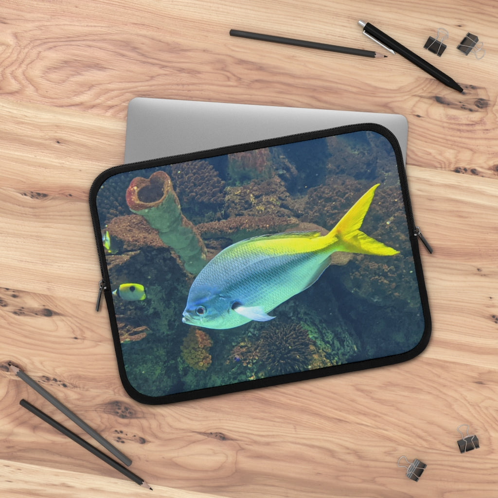 Light Blue and Yellow Fish Laptop Sleeve featuring a vibrant fish design and a black polyester back, ideal for protecting laptops.