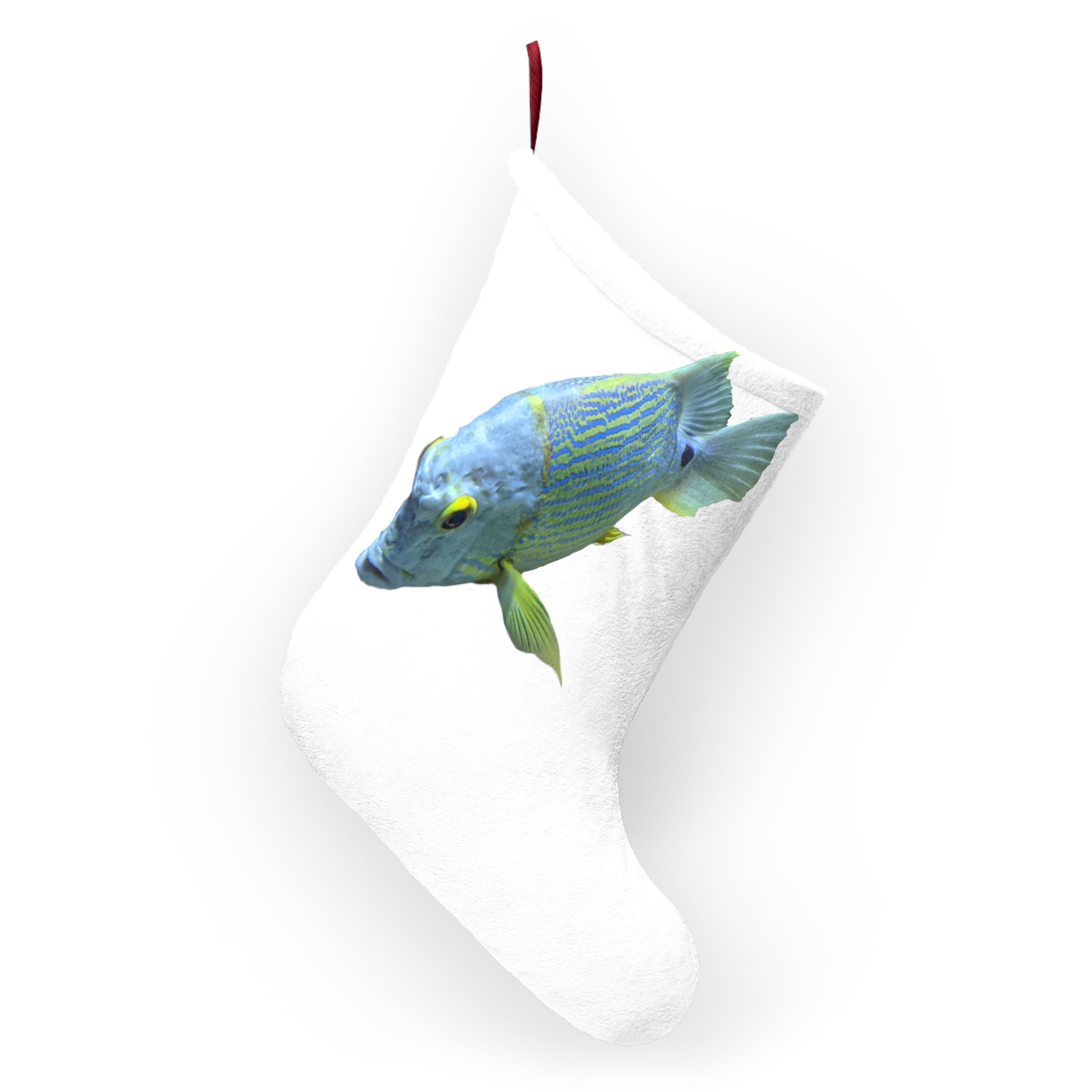 Light Blue Fish Christmas Stockings hanging by a fireplace, featuring a soft fleece material and festive design.