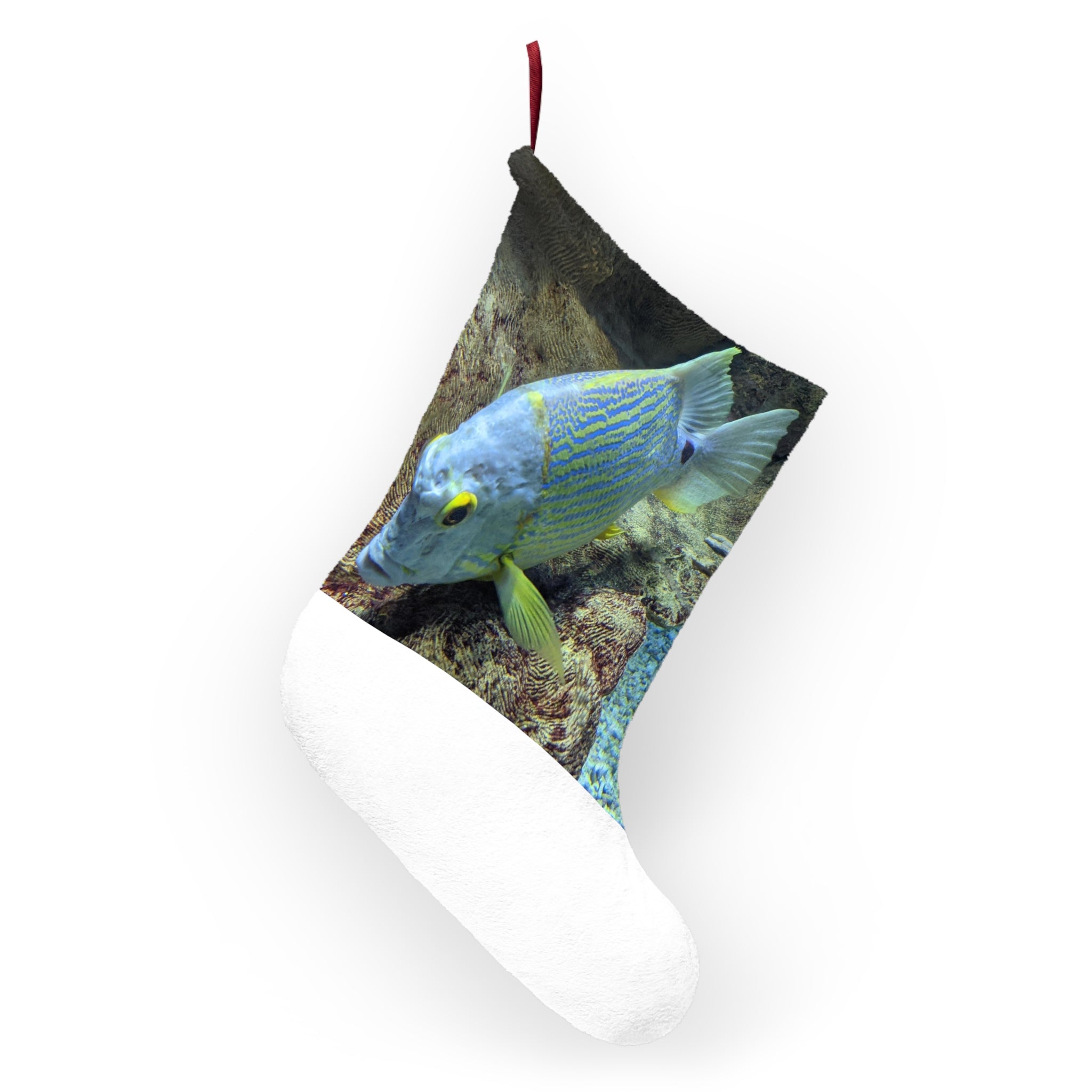 Light Blue Fish Christmas Stockings hanging by a fireplace, featuring a soft fleece material and festive fish designs.