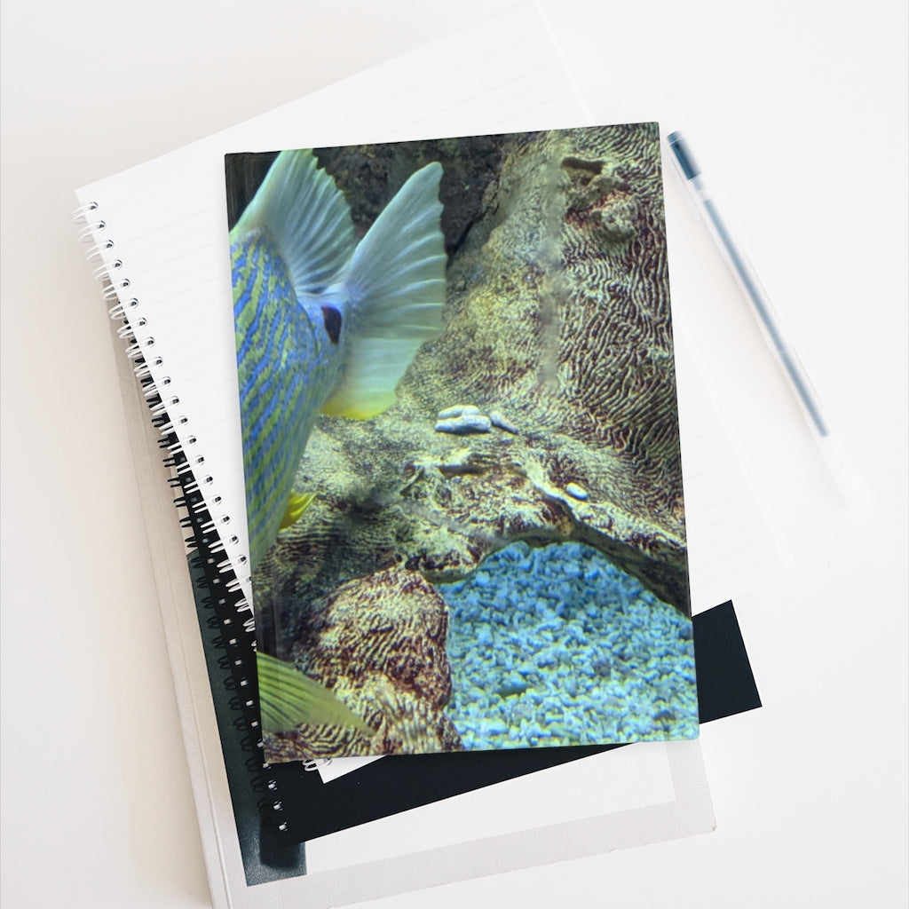 Light Blue Fish Journal with blank pages and vibrant wraparound print, perfect for sketches and notes.