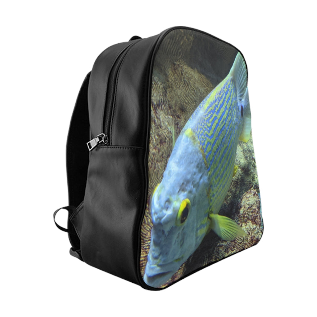 Light Blue Fish School Backpack featuring a vibrant fish print, padded back, and chocolate brown lining, perfect for school and everyday use.