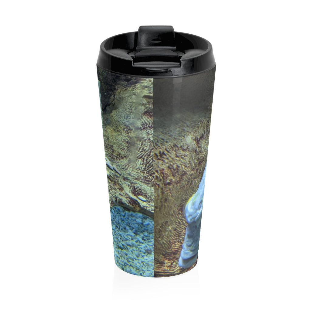 Light Blue Fish Stainless Steel Travel Mug with a stylish fish design and black plastic lid, perfect for coffee and tea lovers.