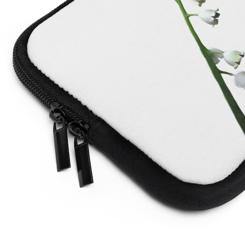 Lilly Laptop Sleeve featuring a customizable front design and black polyester back, showcasing its water-resistant and durable construction.