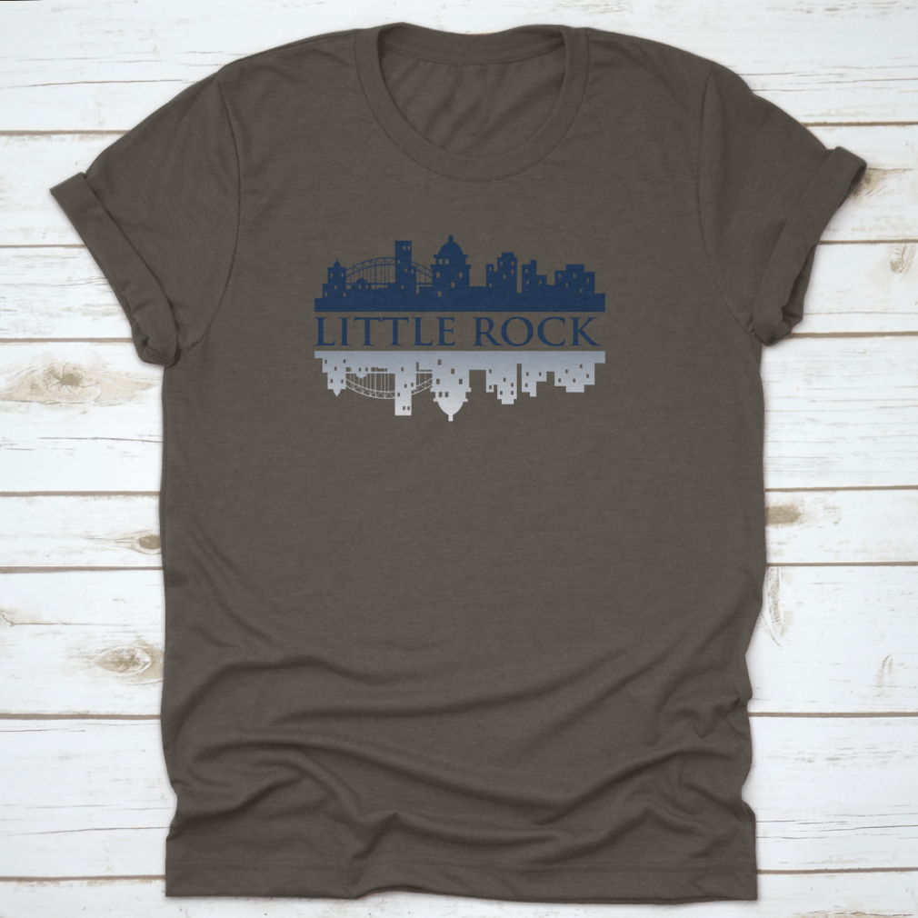 A trendy Little Rock Skyline City Logo T-Shirt displayed on a mannequin, showcasing its classic fit and vibrant skyline design.