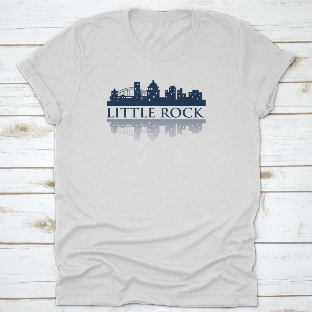 A trendy Little Rock Skyline City Logo T-Shirt displayed on a mannequin, showcasing its classic fit and vibrant skyline design.