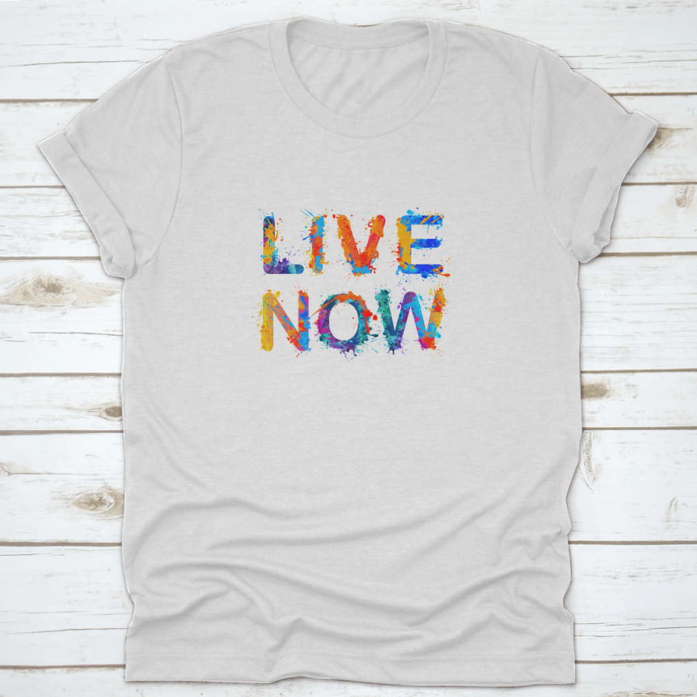 Live Now motivational t-shirt featuring a vibrant splash paint design, made from 100% cotton for comfort and style.