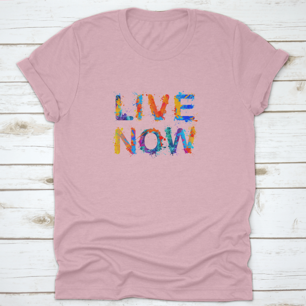 Live Now motivational t-shirt featuring a vibrant splash paint design, made from 100% cotton for comfort and style.