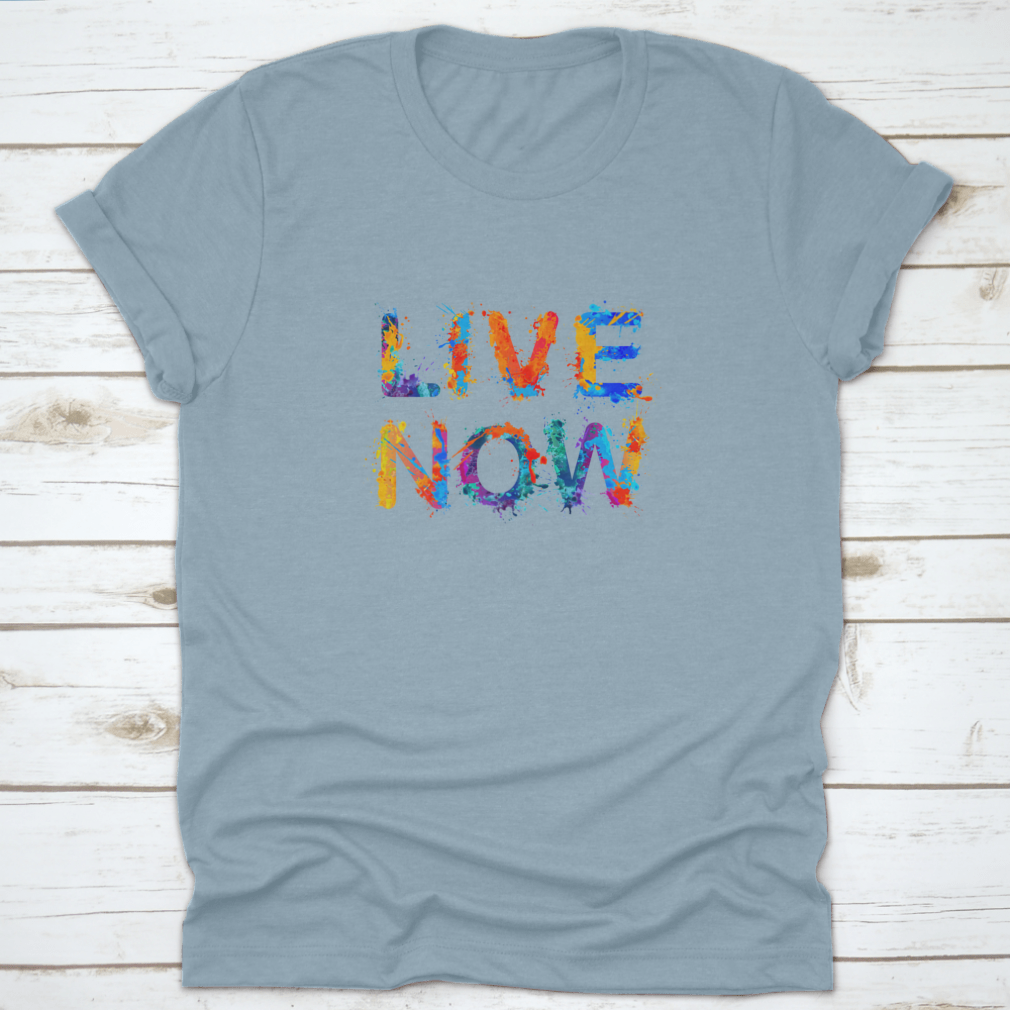 Live Now motivational t-shirt featuring a vibrant splash paint design, made from 100% cotton for comfort and style.