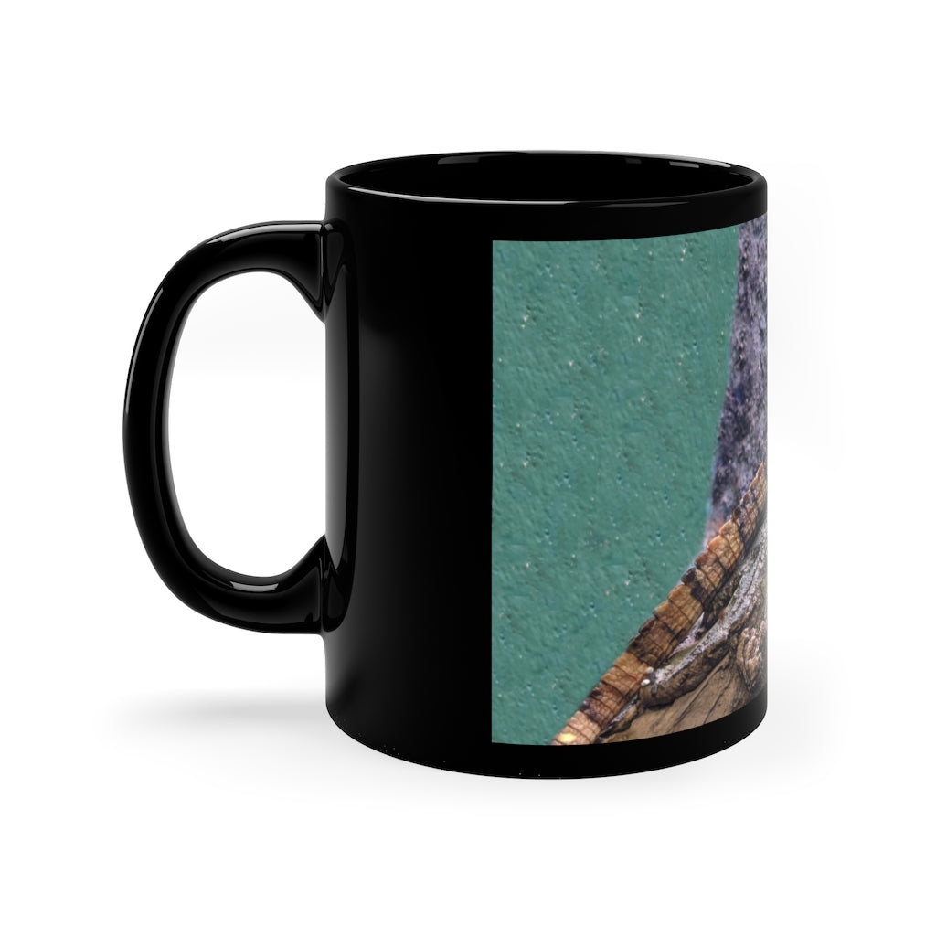 Lizard 11oz black ceramic mug with a sleek design, perfect for coffee, tea, or hot chocolate.