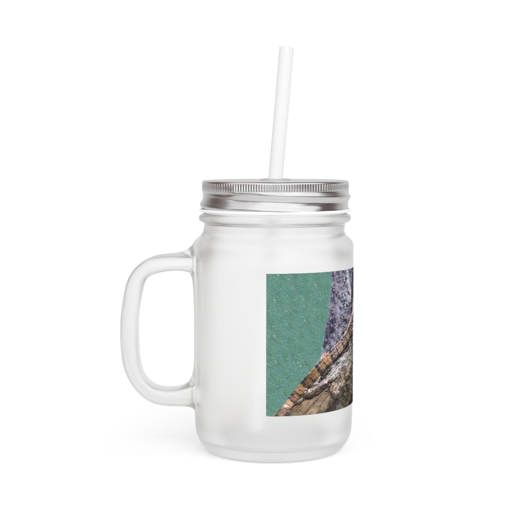 A stylish Lizard Mason Jar made of frosted glass, featuring a straw and lid, perfect for personalized drinks.