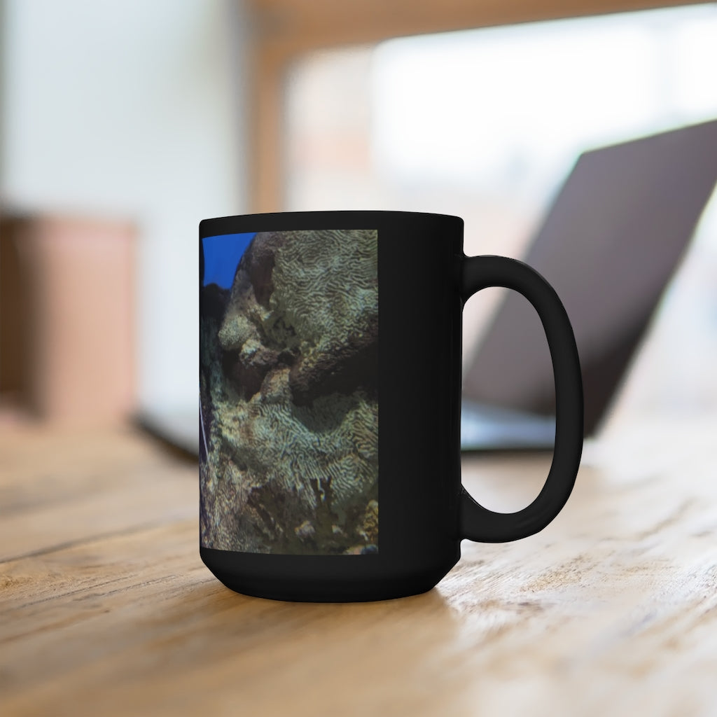 A stylish 15oz black ceramic mug with rounded corners and a comfortable C-handle, perfect for coffee and tea lovers.