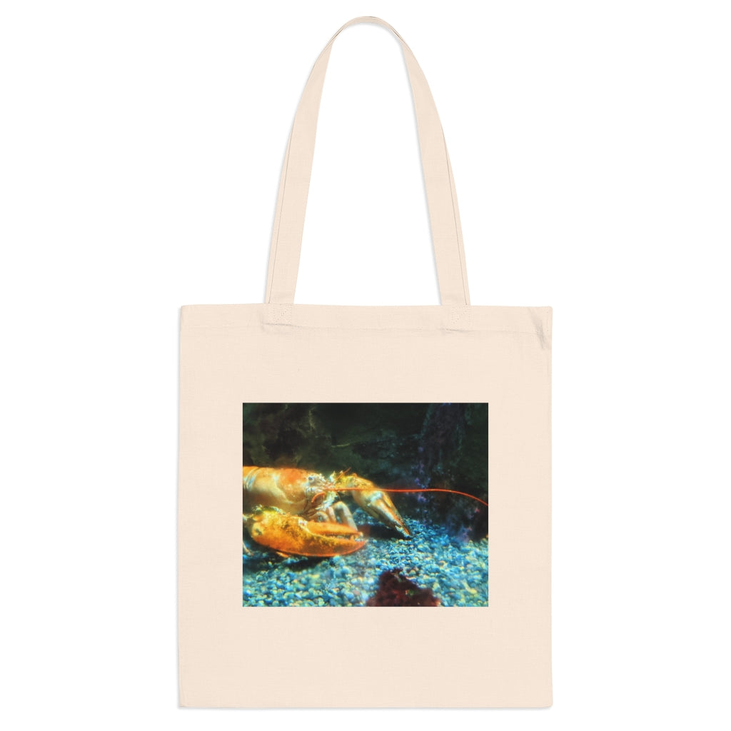 A colorful Lobster Tote Bag made of 100% cotton with long handles and cross stitching for durability, perfect for everyday use.