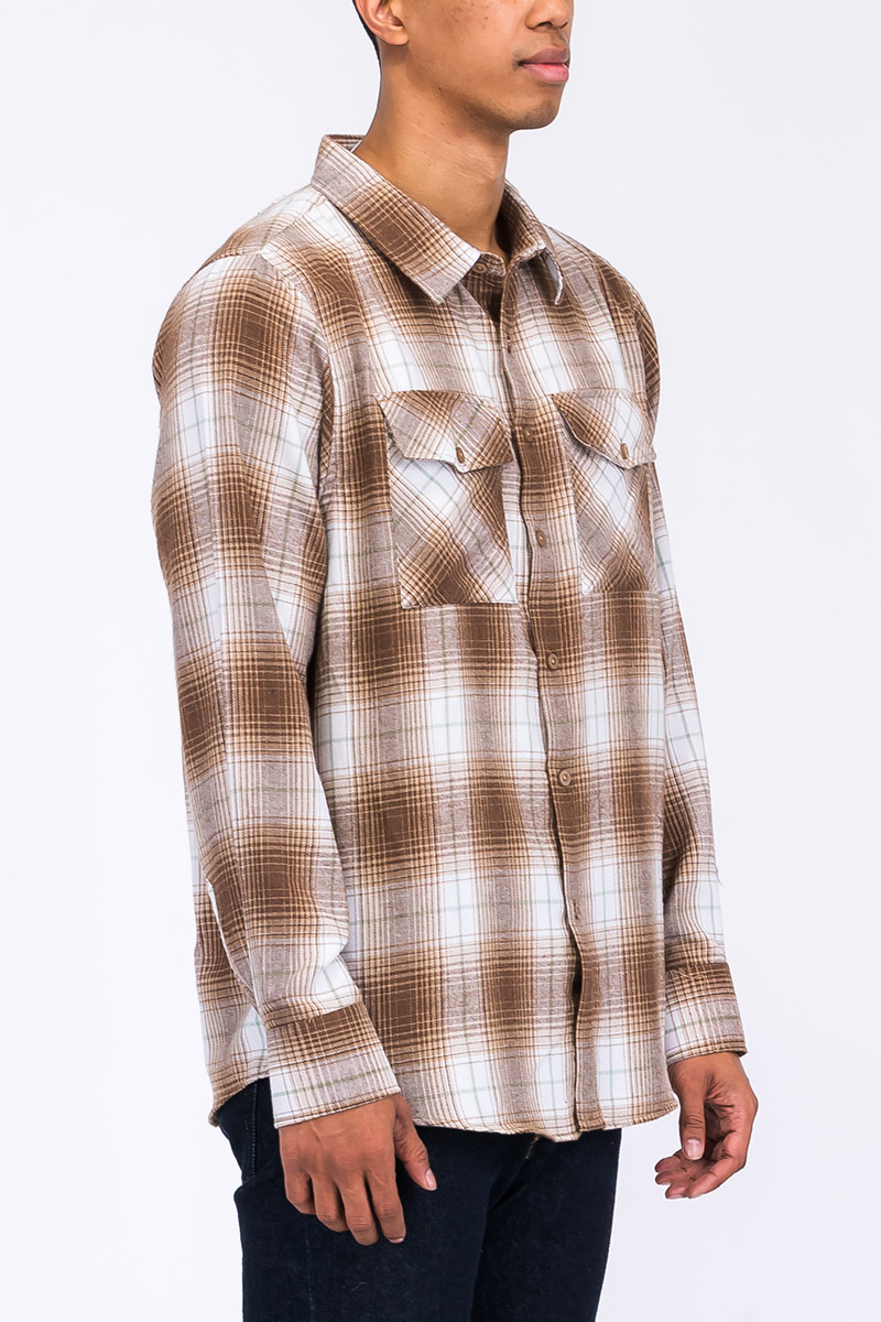 A stylish Long Sleeve Checkered Flannel Shirt featuring a classic checkered pattern, chest pockets, and a curved hem, perfect for casual wear.