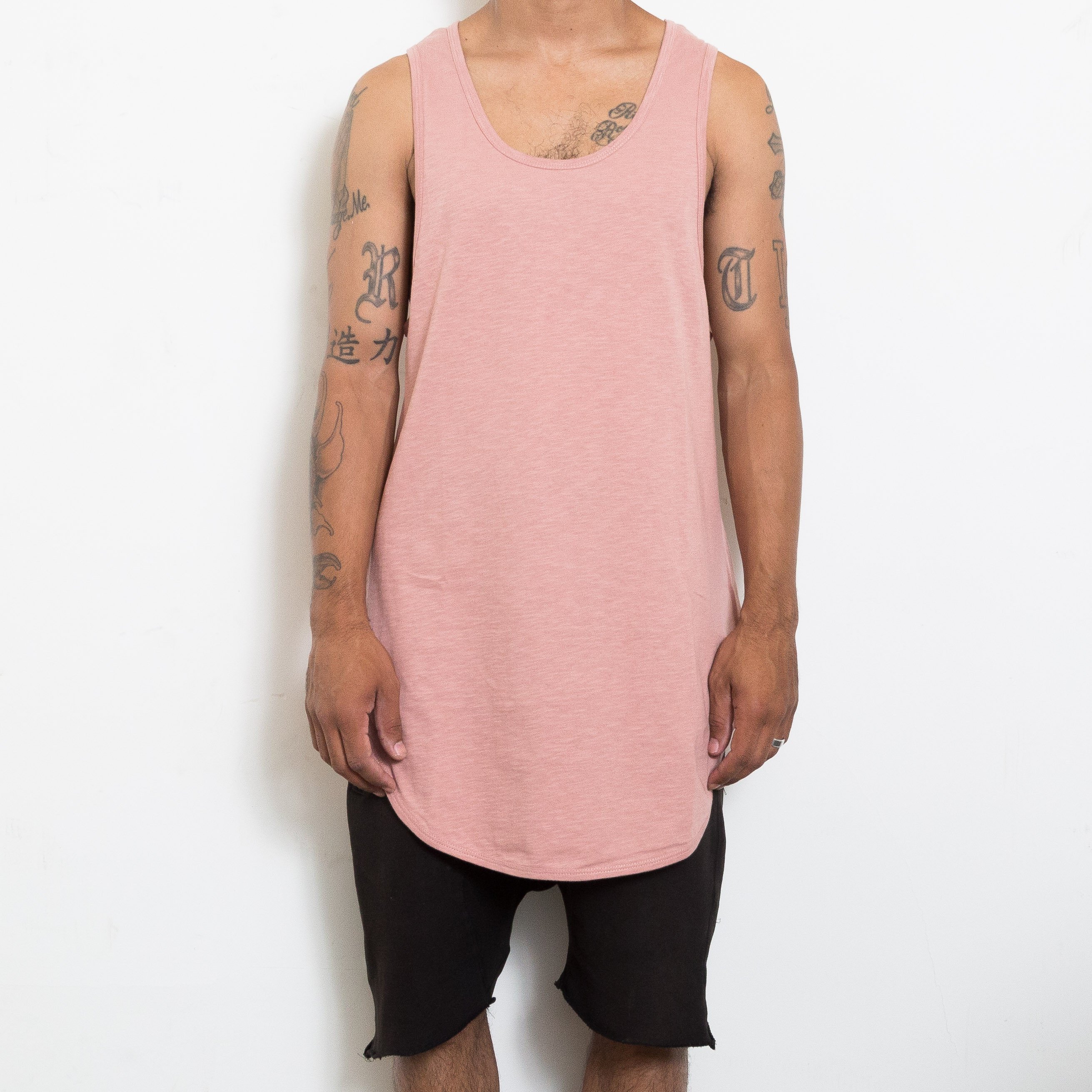 Longline Scallop Tank in Rose, featuring an extended scoop neckline and muscle tank style, perfect for casual wear.