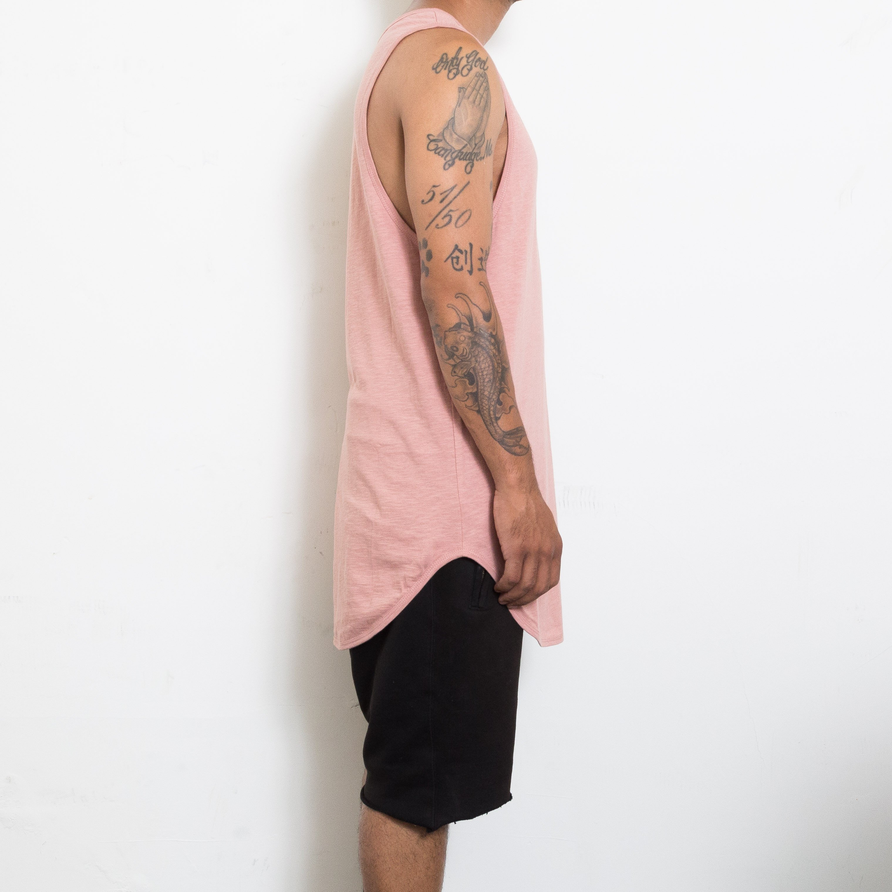 Longline Scallop Tank in Rose, featuring an extended scoop neckline and muscle tank style, perfect for casual wear.