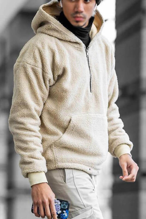 A stylish loose zipper hoodie made of polyester, featuring front pockets and a comfortable fit, perfect for casual wear.