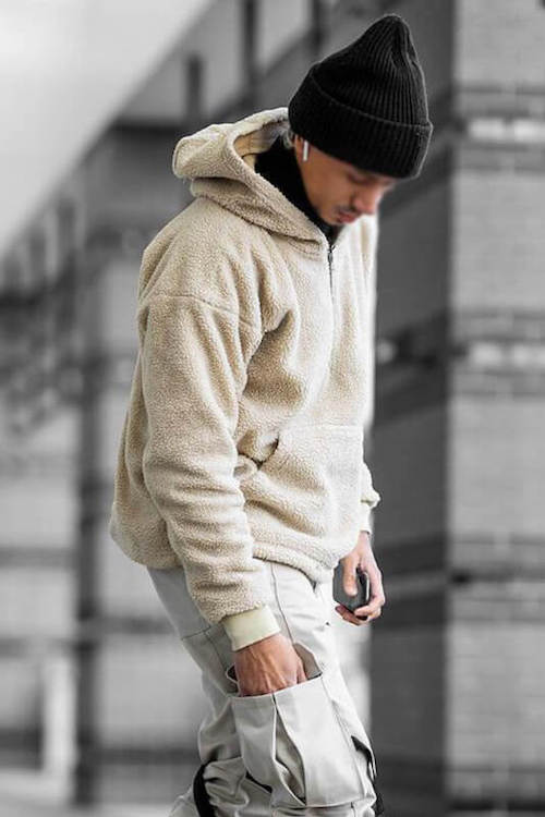 A stylish loose zipper hoodie made of polyester, featuring front pockets and a comfortable fit, perfect for casual wear.