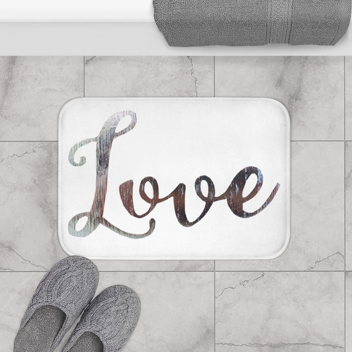 Stylish Love Bath Mat with anti-slip backing in a bathroom setting, showcasing its plush microfiber texture and elegant design.