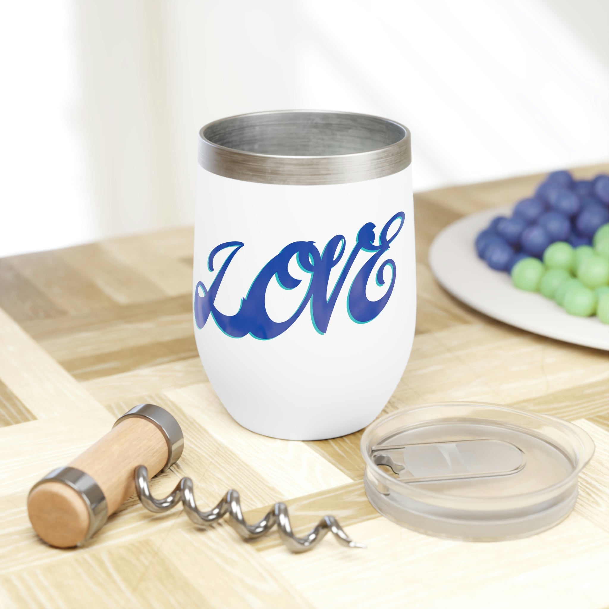 A stylish Love Chill Wine Tumbler made of stainless steel, featuring a customizable design and double-insulated walls for temperature retention.