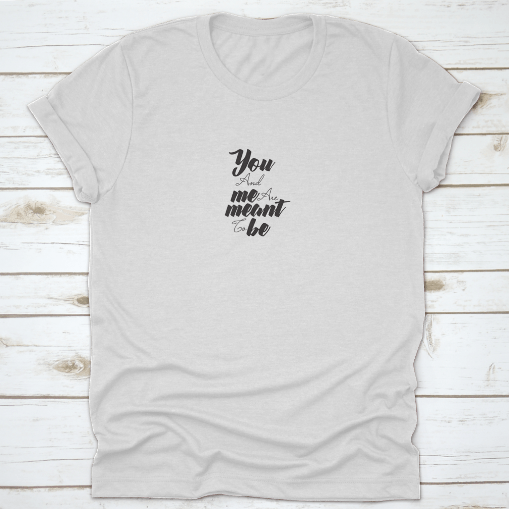 A comfortable 'You And Me Are Meant To Be' t-shirt made from 100% cotton, showcasing a classic fit and midweight fabric, perfect for expressing love.