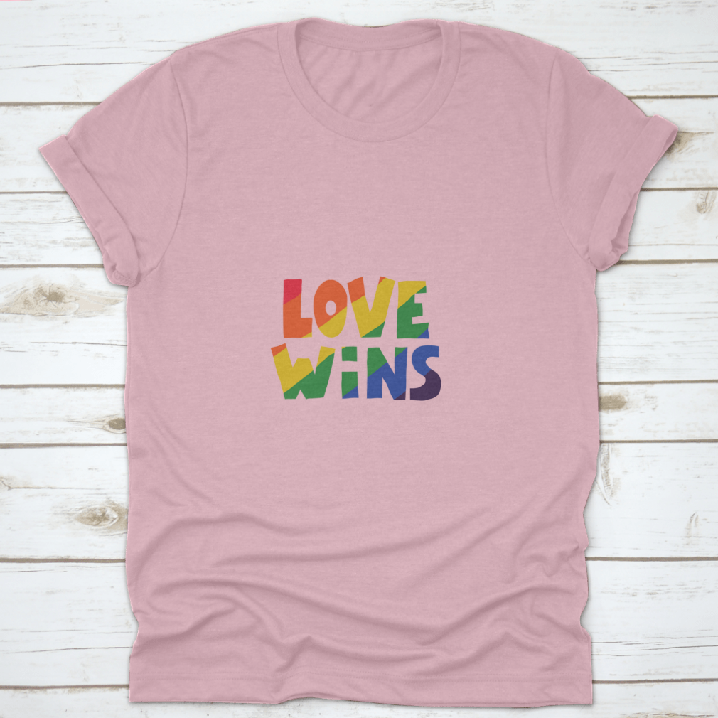 A stylish shirt featuring 'Love Wins' lettering in vibrant rainbow colors, symbolizing love and inclusivity.