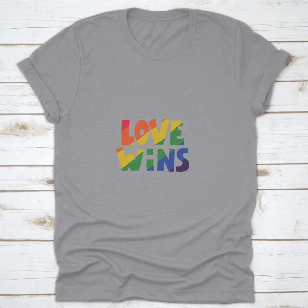 A stylish shirt featuring 'Love Wins' lettering in vibrant rainbow colors, symbolizing love and inclusivity.