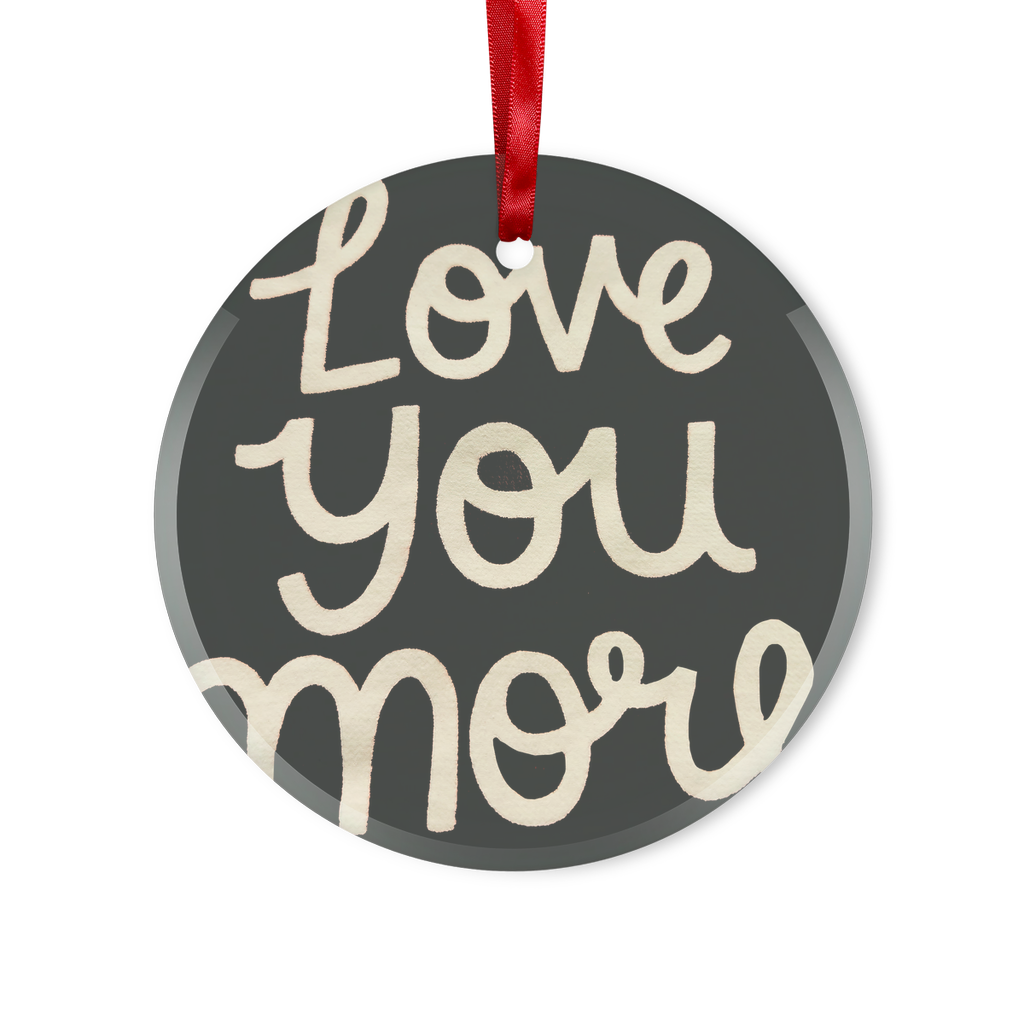 Love You More Glass Hanging Ornament in round and heart shapes, featuring a red ribbon and gold string, elegantly packaged in a white box.