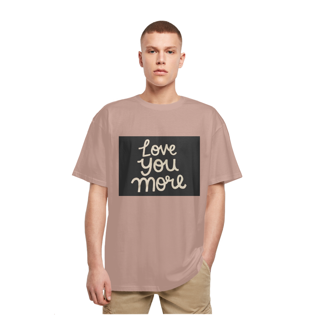 Love You More Heavy Oversized T-Shirt featuring a classic crew neck, dropped shoulders, and soft cotton fabric in a stylish oversized fit.