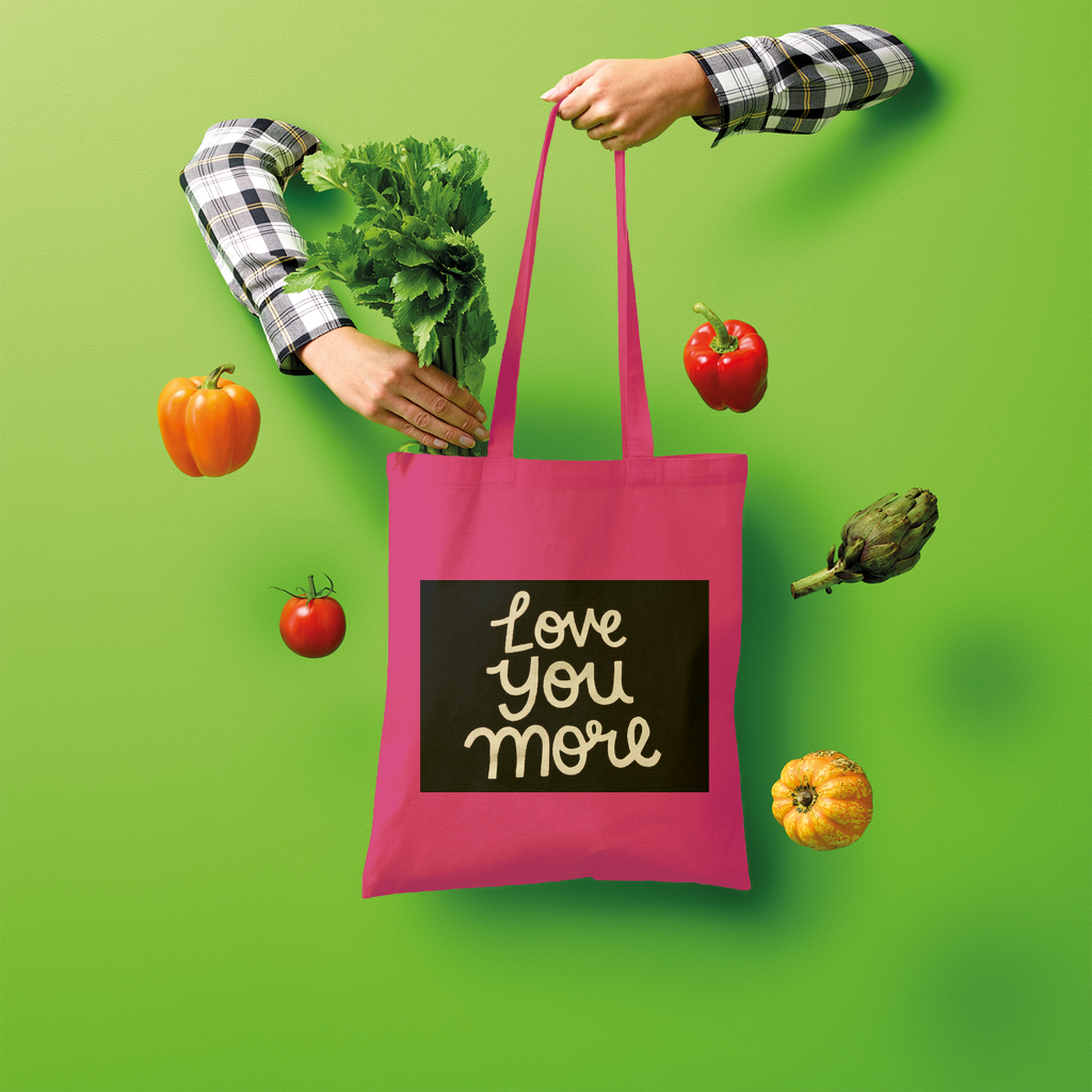 Love You More Shopper Tote Bag made of 100% cotton, featuring a spacious design and comfortable shoulder straps, ideal for eco-friendly shopping.