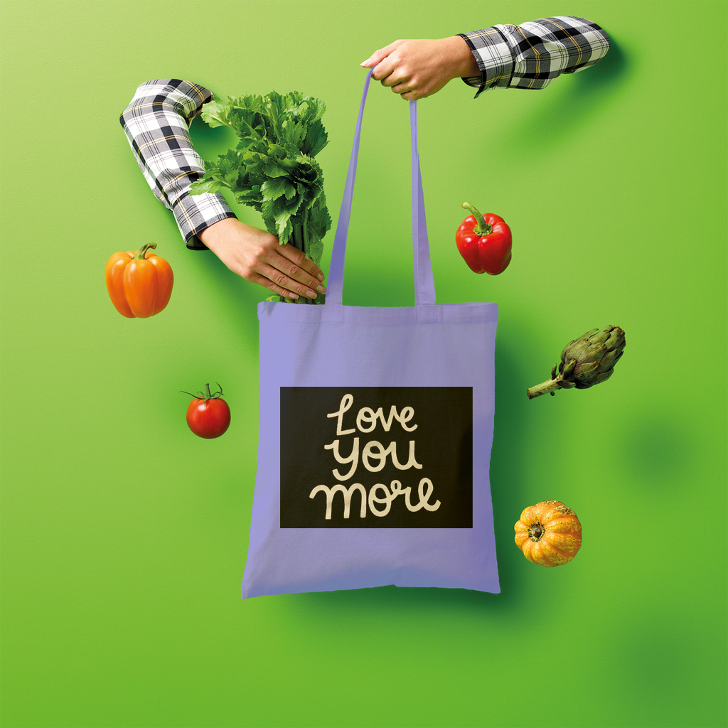 Love You More Shopper Tote Bag made of 100% cotton, featuring a spacious design and comfortable shoulder straps, ideal for eco-friendly shopping.