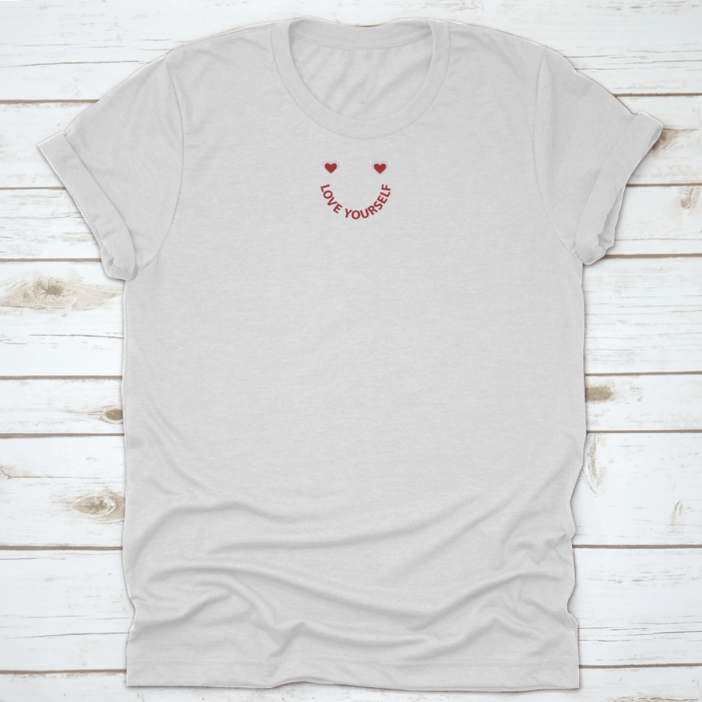 A vibrant red t-shirt featuring a heart smile graphic, made from 100% cotton, showcasing a classic fit and midweight fabric.