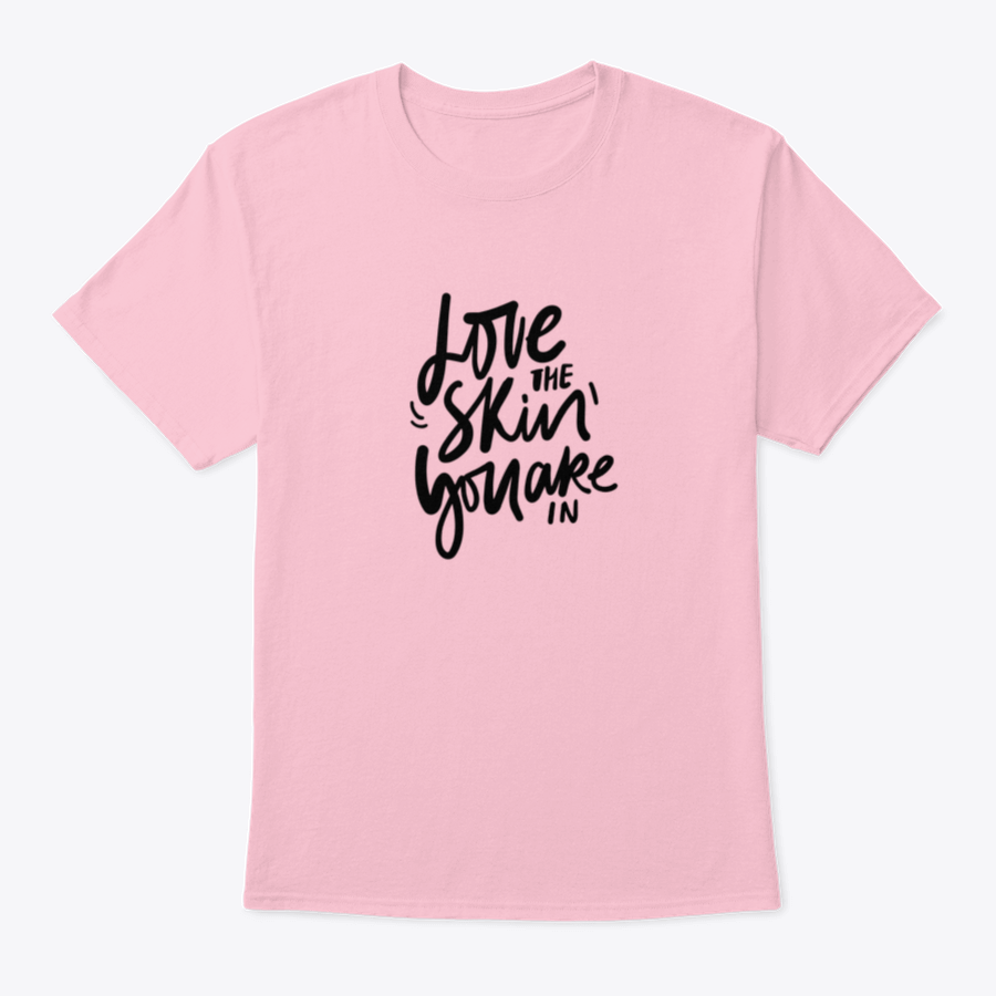 A stylish calligraphic shirt design featuring the quote 'Love Your Skin You Are In', made from soft cotton fabric.