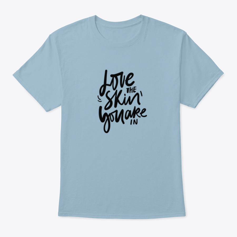 A stylish calligraphic shirt design featuring the quote 'Love Your Skin You Are In', made from soft cotton fabric.