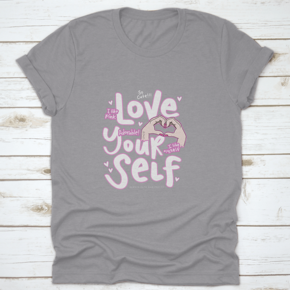 A cute pink t-shirt featuring the phrase 'I Like Pink I Like Myself', showcasing a stylish and positive design.