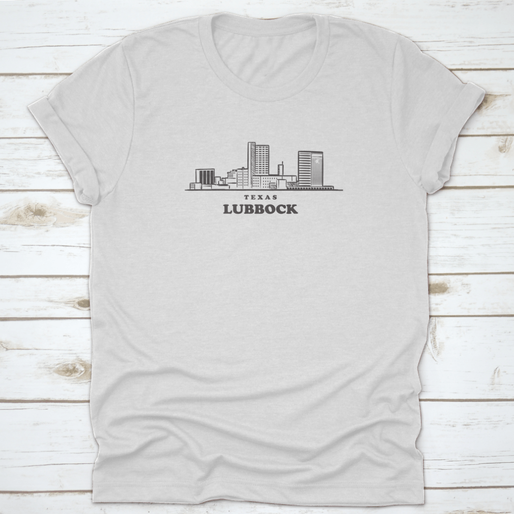 A stylish travel shirt featuring a drawn sketch of the Lubbock Texas skyline, made from soft cotton fabric.