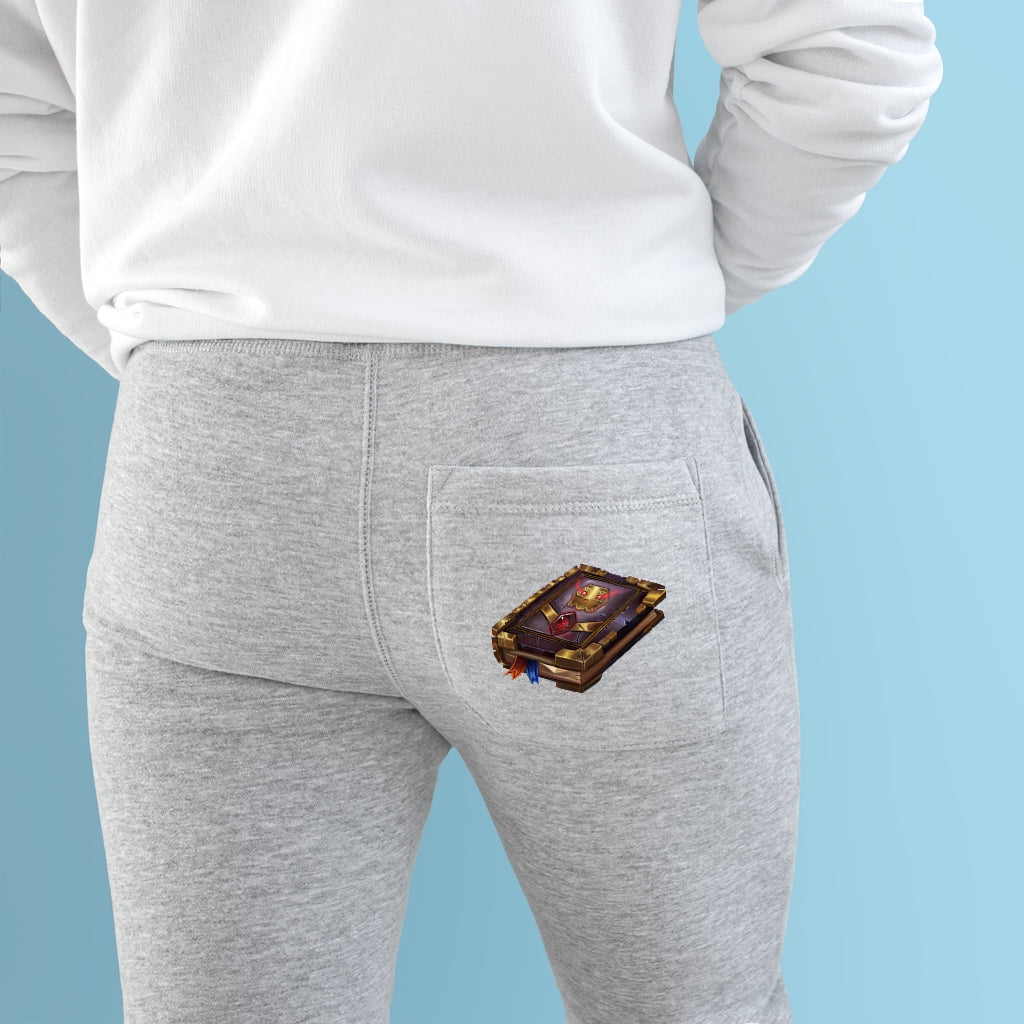 A pair of stylish Magic Book Premium Fleece Joggers featuring a customizable back pocket and two side pockets, made from soft fleece material.