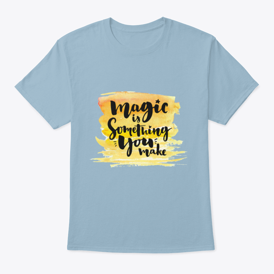 A vibrant yellow watercolor background featuring the phrase 'Magic Is Something You Make' in elegant brush lettering, showcasing creativity and artistic expression.