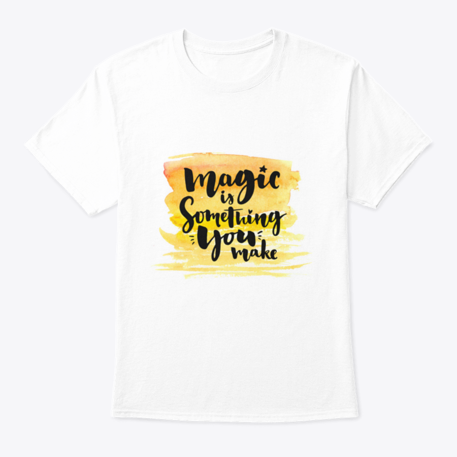 A vibrant yellow watercolor background featuring the phrase 'Magic Is Something You Make' in elegant brush lettering, showcasing creativity and artistic expression.