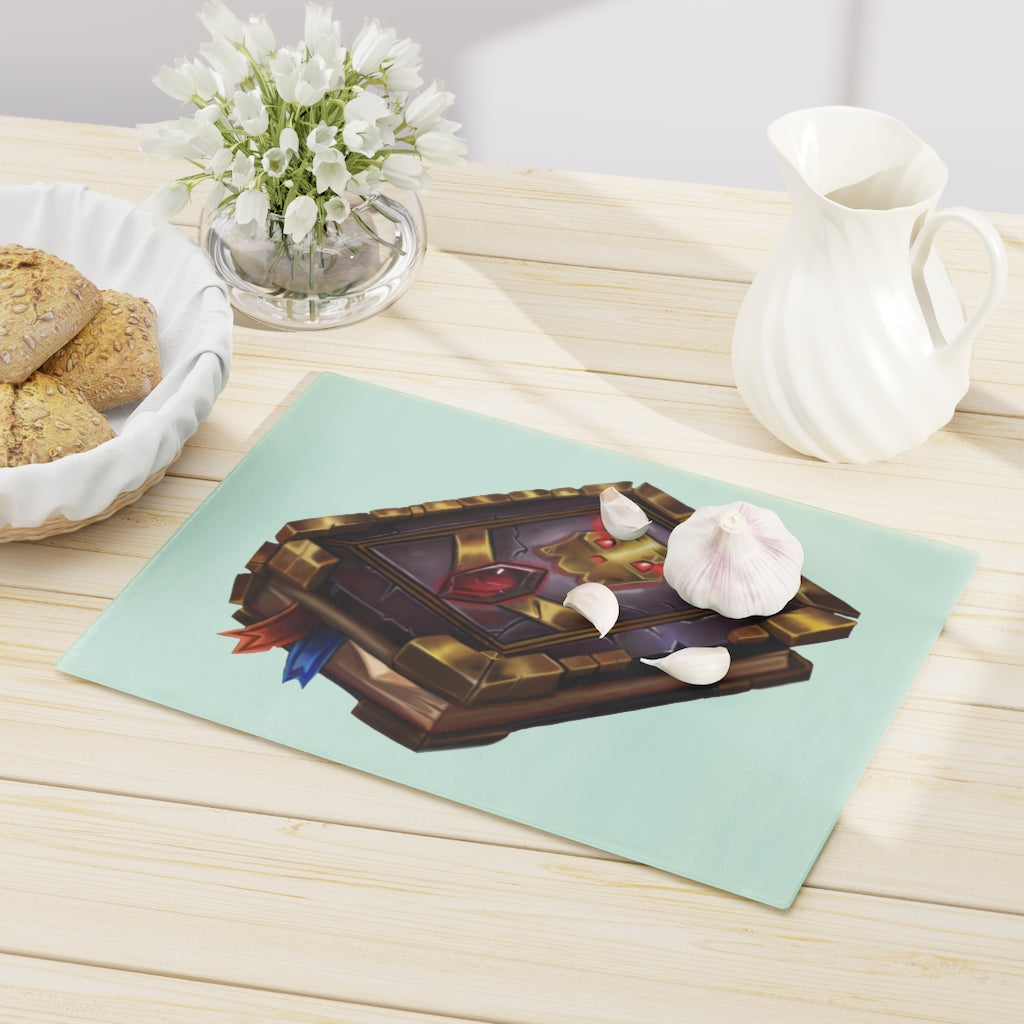 Magic Spell Book Cutting Board made of tempered glass with rubber dots for stability, featuring a whimsical spell book design.