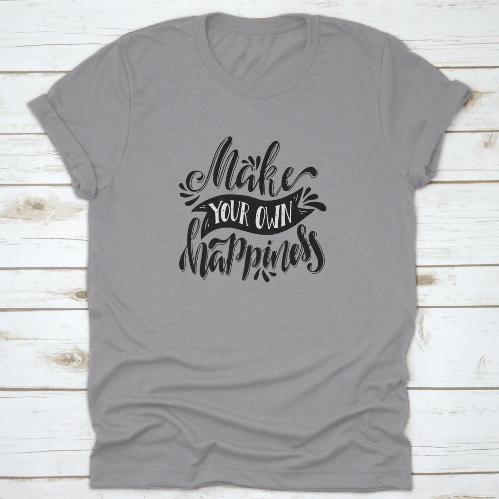 A stylish t-shirt featuring a hand-drawn illustration with the quote 'Make Your Own Happiness', showcasing a positive and uplifting design.